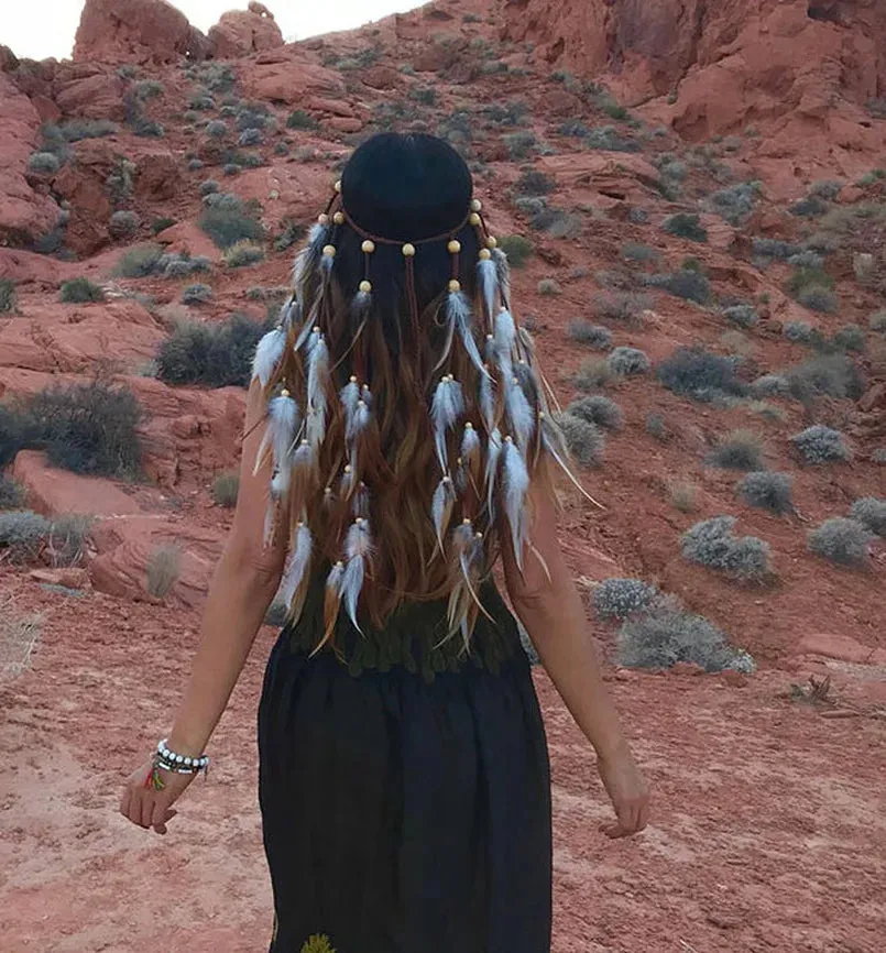 Boho Elegance Unleashed: Embrace Festival Vibes with our Bohemian Feather Hairband