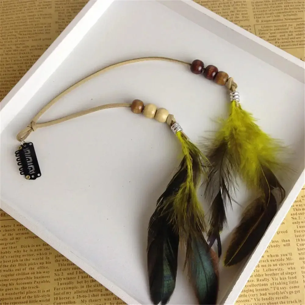 Boho Elegance Unleashed: Embrace Festival Vibes with our Bohemian Feather Hairband