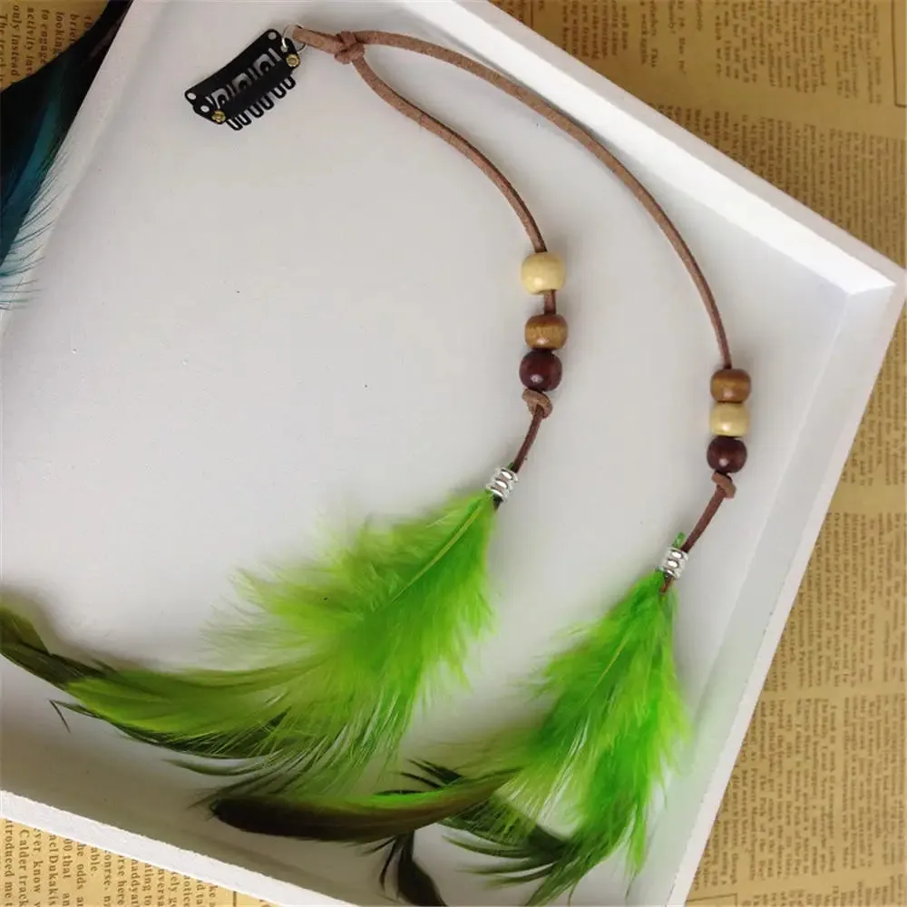 Boho Elegance Unleashed: Embrace Festival Vibes with our Bohemian Feather Hairband