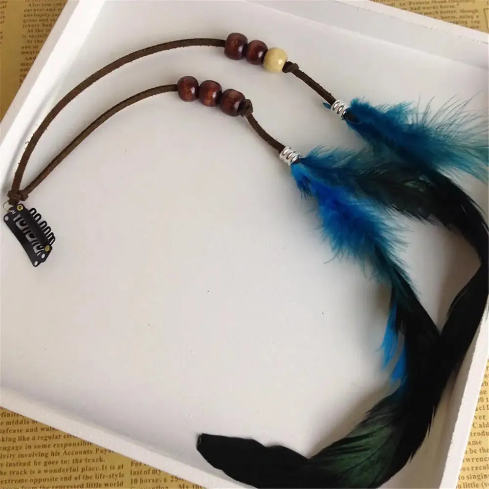 Boho Elegance Unleashed: Embrace Festival Vibes with our Bohemian Feather Hairband