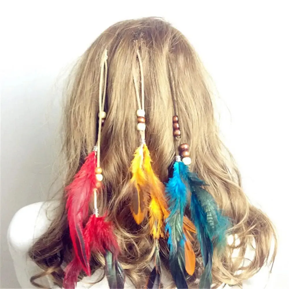 Boho Elegance Unleashed: Embrace Festival Vibes with our Bohemian Feather Hairband